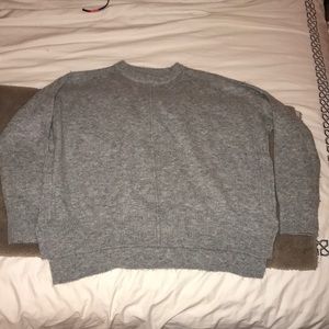 Grey sweater with side zippers